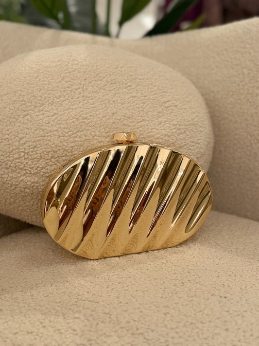 Lidia | Clutch rígido con ondas - Dorado