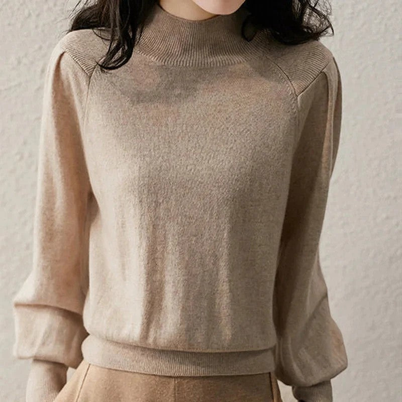 Jersey de mujer con mangas farol y cuello redondo