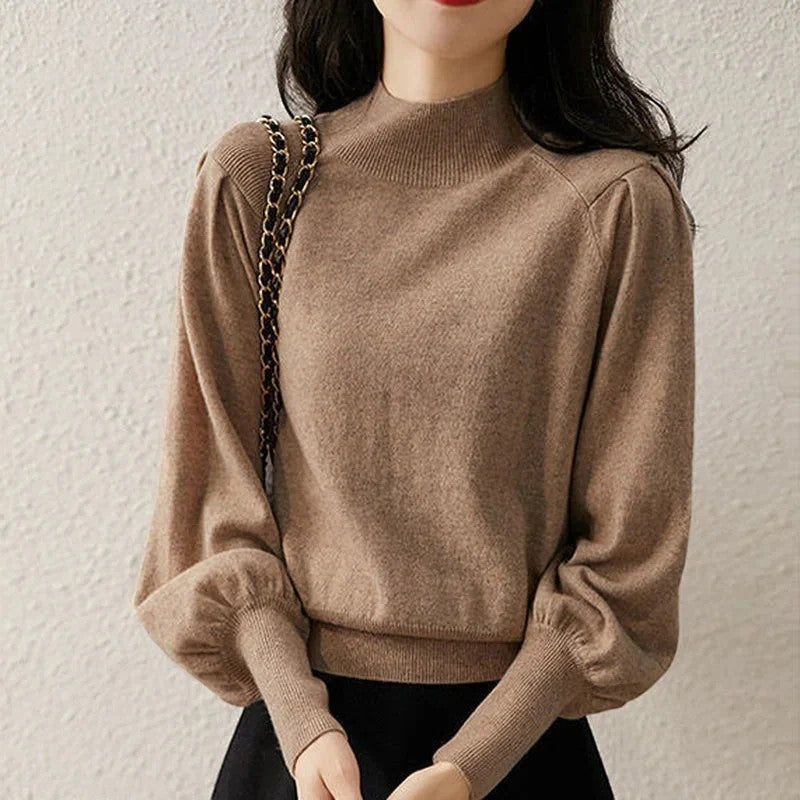Jersey de mujer con mangas farol y cuello redondo