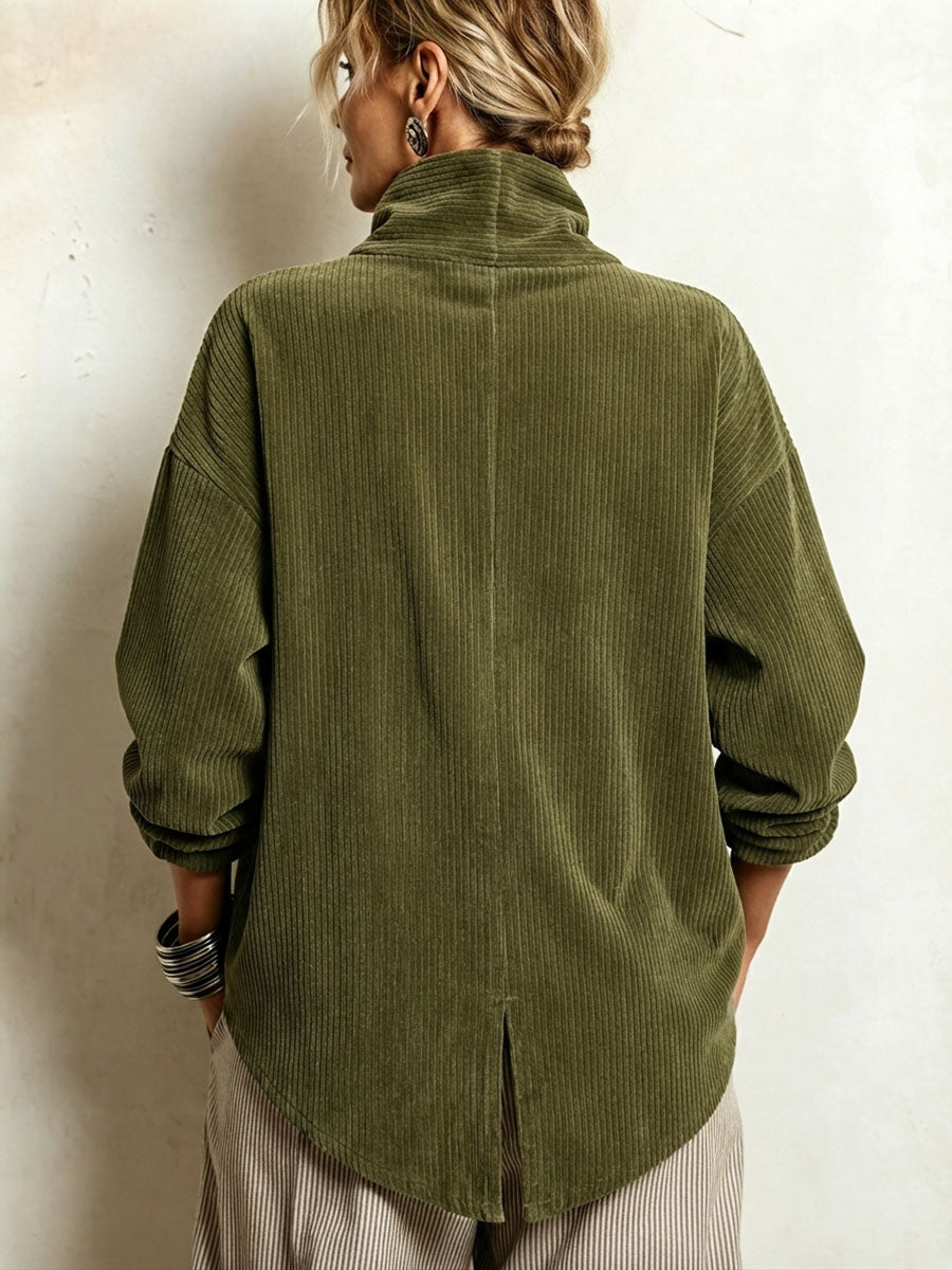 Top de pana asimétrico y elegante con cuello alto tipo embudo